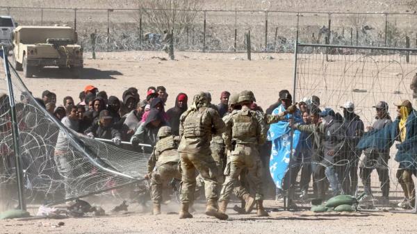 migrants rushing the border 