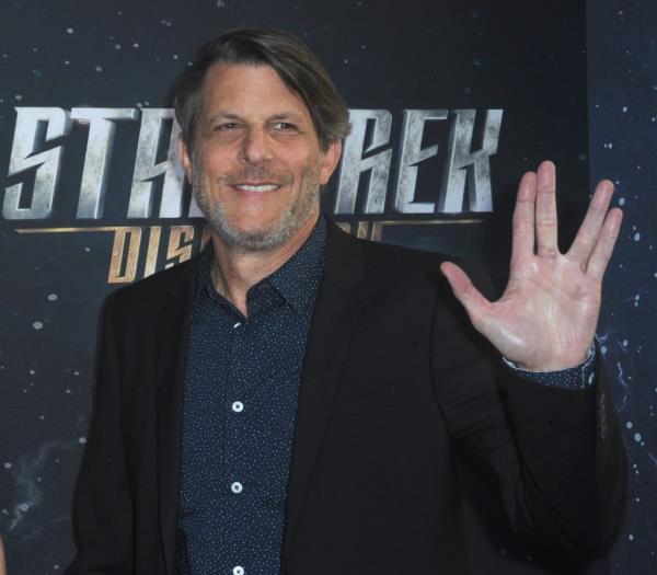 Adam Nimoy flashes the Vulcan salute that's syno<em></em>nymous with his dad's most famous character.