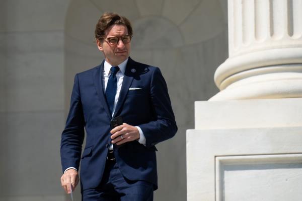 Rep. Dean Phillips, D-Minn., walks down the House steps after the last votes of the week in the Capitol on Thursday, April 20, 2023.