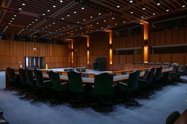 The hearing room is pictured.