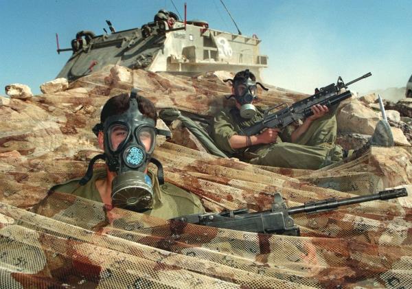 Israelis wearing gas masks