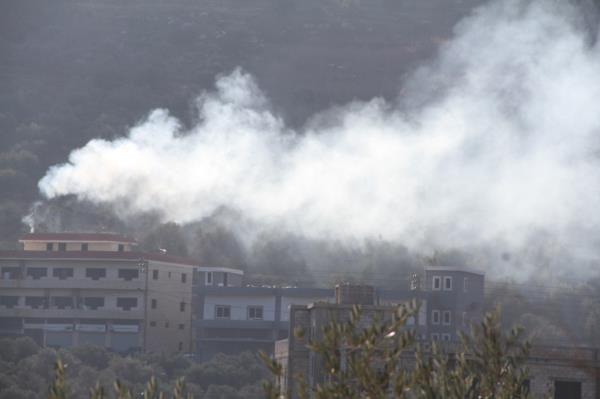 Smoke rises following an Israeli shelling in Kafr Kila, Lebanon on Dec. 15, 2023.