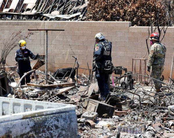 Recovery teams search the burn zone for human remains following the deadliest wildfire in Hawaii history.