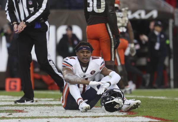 Bears wide receiver Darnell Moo<em></em>ney sits in the end zone after he couldn’t hold o<em></em>nto a Hail Mary pass on the final play of the fourth quarter on Dec. 17, 2023, at Cleveland Browns Stadium.