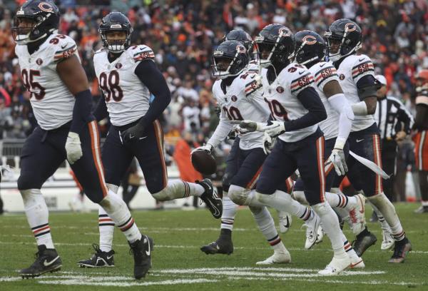Bears cornerback Tyrique Stevenson celebrates his interception in the third quarter on Dec. 17, 2023, at Cleveland Browns Stadium.