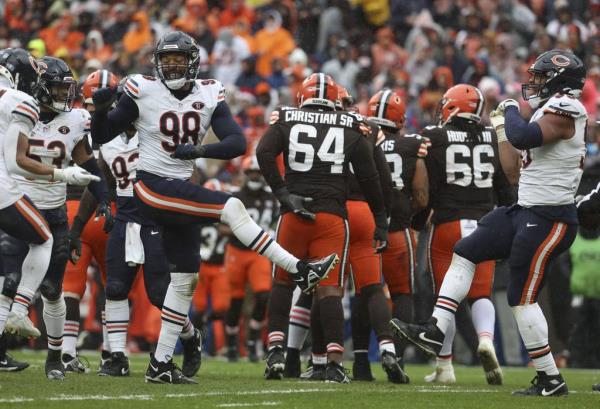 Bears defensive end Mo<em></em>ntez Sweat celebrates after sacking Browns quarterback Joe Flacco in the third quarter on Dec. 17, 2023, at Cleveland Browns Stadium. 