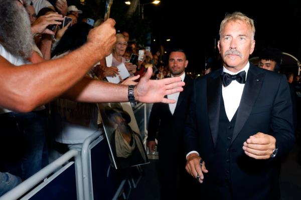 Kevin Costner leaves the screening of his new movie 
