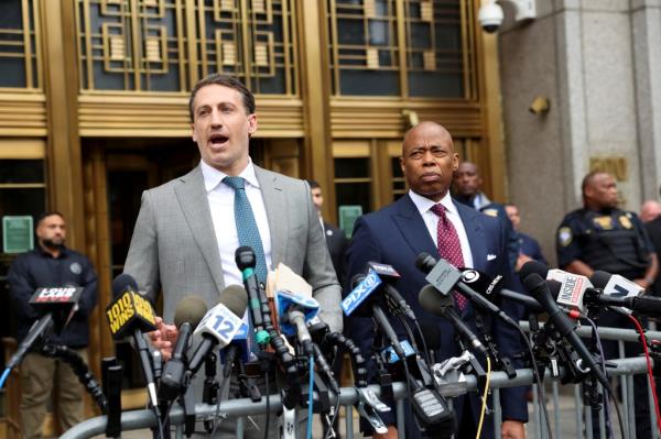 Alex Spiro and Eric Adams at a September press co<em></em>nference following Adams' indictment on corruption charges. 