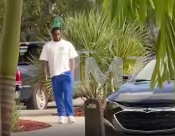 Sean 'Diddy' Combs speaking to federal agents at an airport