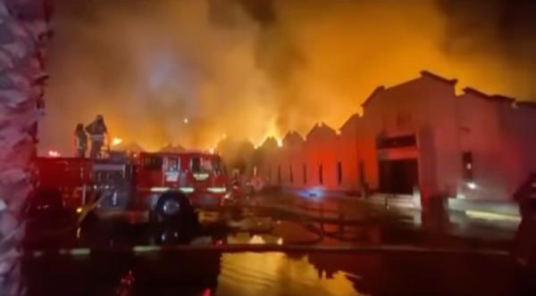 The early morning fire is seen destroying the church hours before a toy drive event. 