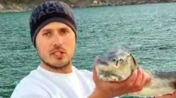 Fisherman releases rarest fish species back into sea