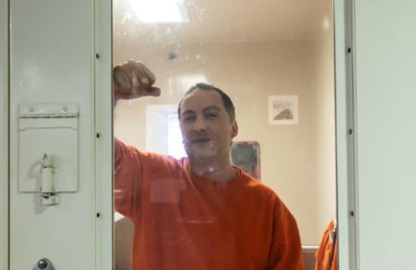 Momeni in jail. 