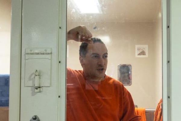 Momeni in jail. 