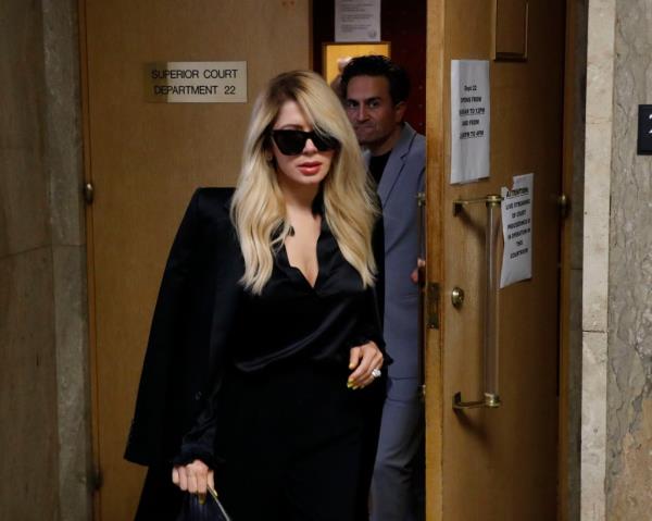 Khazar Momeni leaving court. 