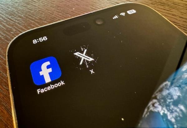 Phone with social media apps on screen