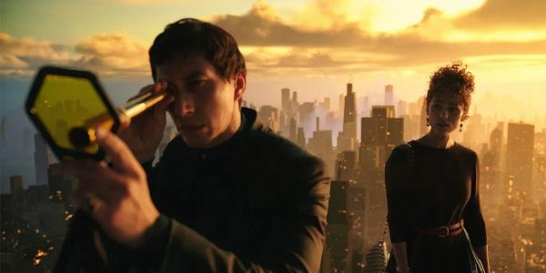 Adam Driver looks through a lens in Megalopolis still 