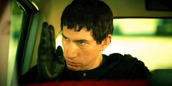 Adam Driver holding up his hand as Cesar Catilina in Megalopolis