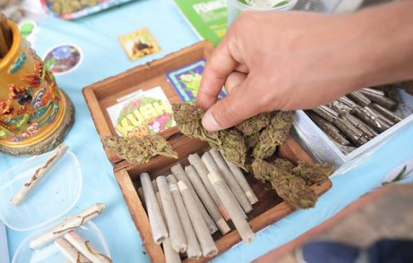 You may experience some symptoms if you decide to go weed-free. Credit: Getty Images/ Daniel Munoz/ AFP