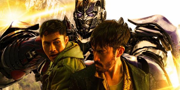 A Transformers robot stands tall behind Henry Golding and Andrew Koji from Snake Eyes