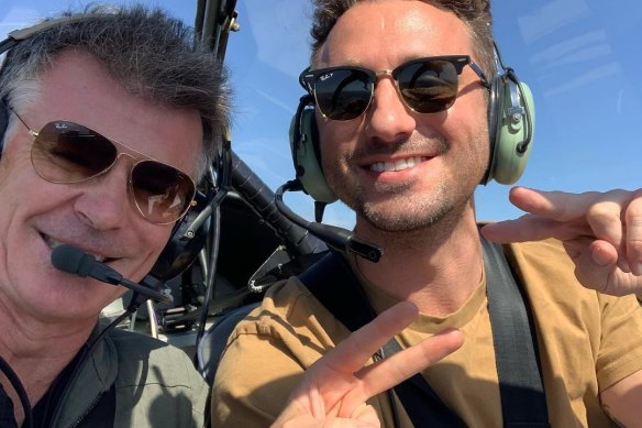 Pilot Stephen Gale (left) pictured with comedian Tommy Little.