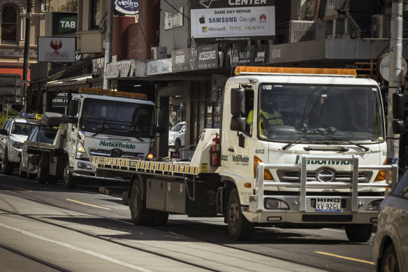 Natio<em></em>nwide Towing trucks looking for illegally parked vehicles on Sydney Road.
